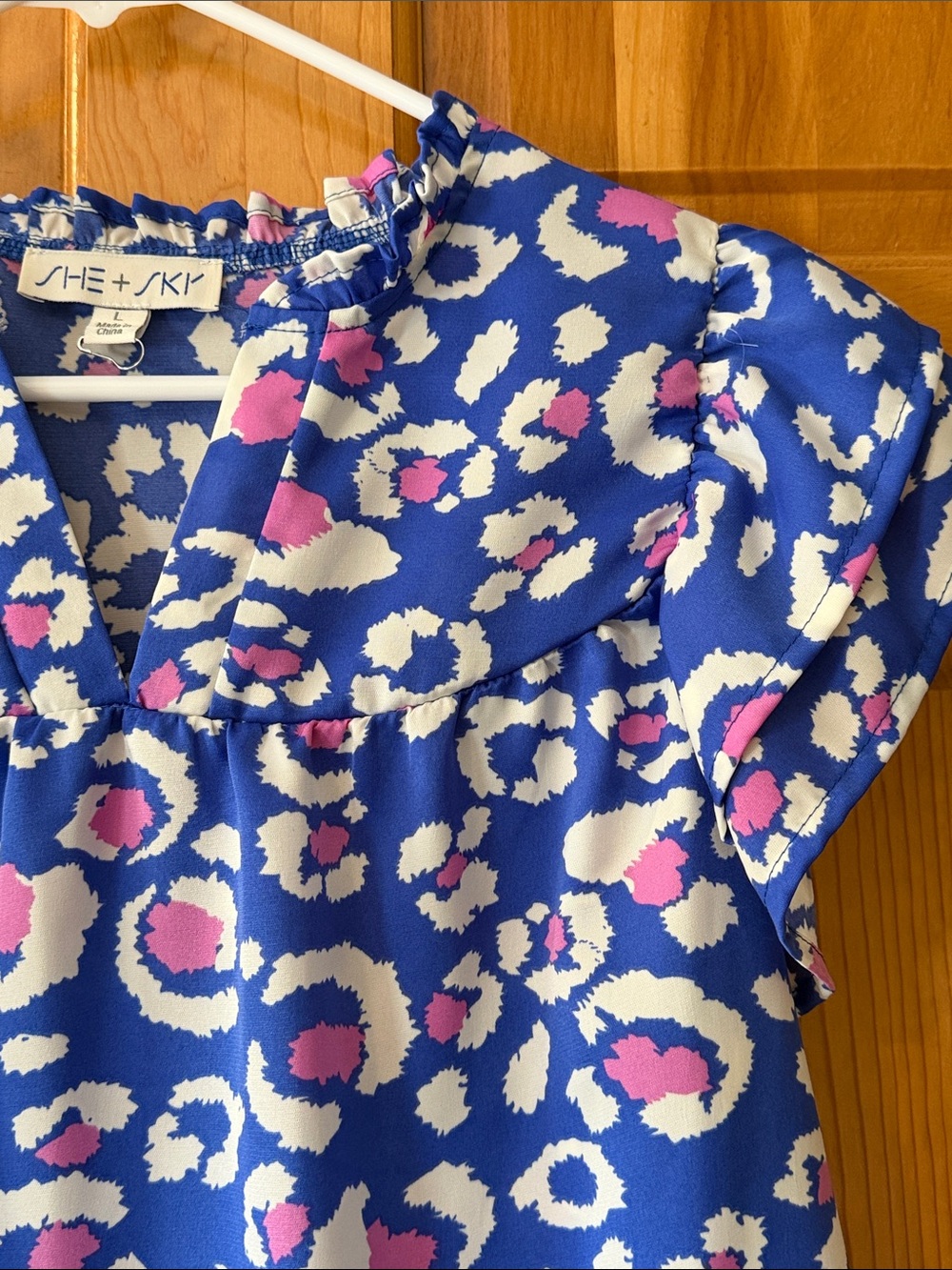 NWOT She + Sky Royal Blue Pink and White Leopard Flutter Sleeve Top